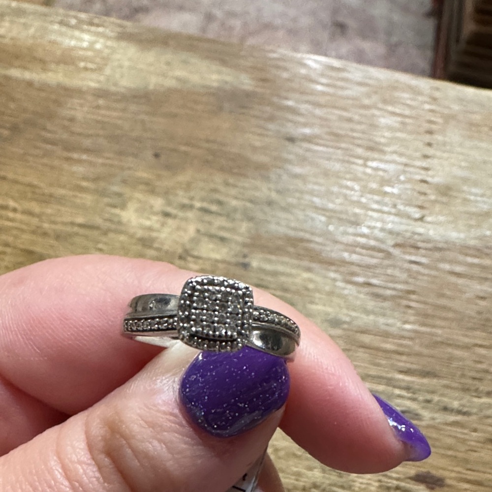 Consignment item..
Sterling silver and Diamond ring